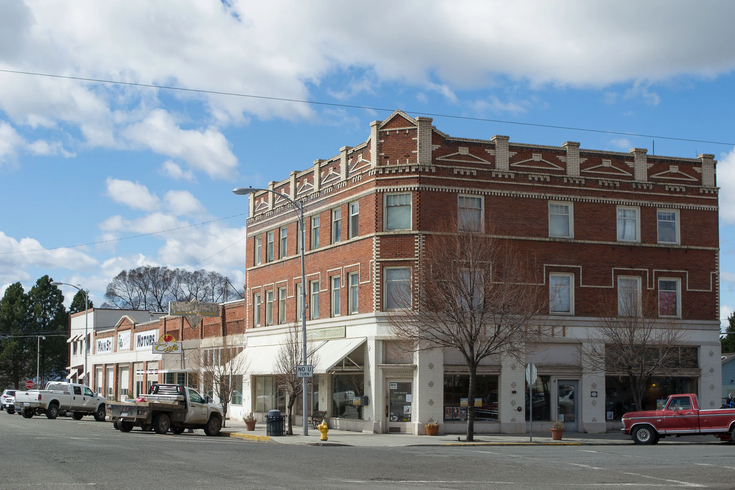 Enterprise’s downtown streetscape. Context photograph; the owner’s photographs of the EM&M itself are linked in the story.